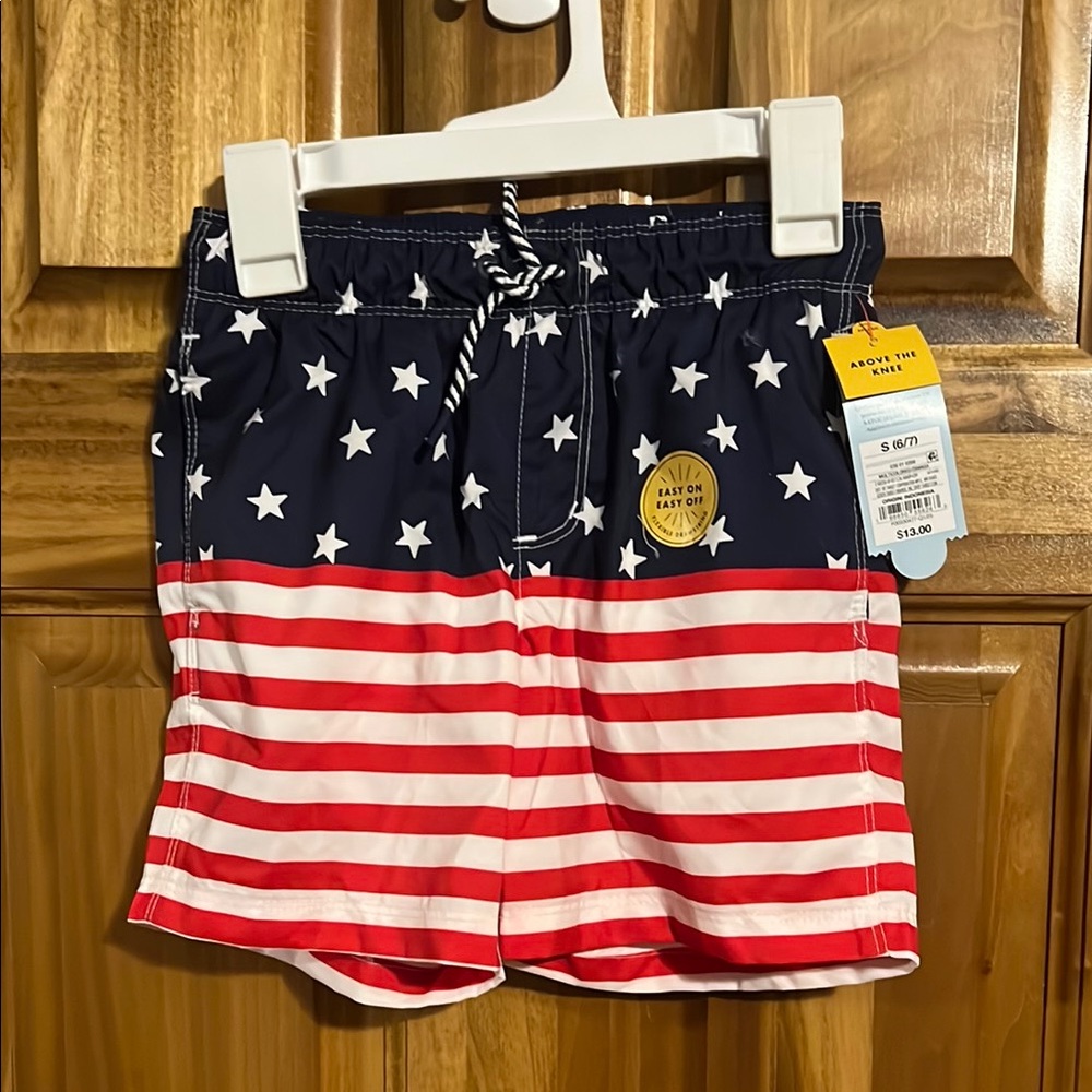 Cat and Jack size small (6/7)Navy and Red Star Striped Swim Shorts